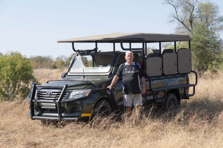Your guide with safari vehicle